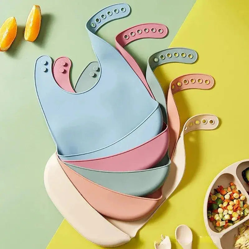 Adjustable Waterproof Baby Bibs made of Soft Silicone, BPA Free - Ideal for Newborns and Children Soft Silicone Baby Bibs - Adjustable, Waterproof & BPA Free.  Aliexpress Lacatang Shop 